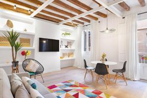 Et tv og/eller underholdning på Apartamento Can Petit