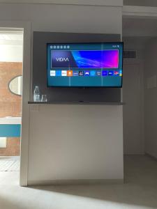 TV a/nebo společenská místnost v ubytování Villa Est