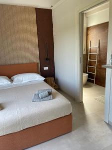 Postel nebo postele na pokoji v ubytování Villa Est