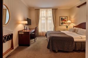 Postel nebo postele na pokoji v ubytování Elite Hotel Mollberg + 37 fotografií