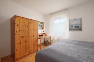 Postel nebo postele na pokoji v ubytování Villa Fördestrand Spinnaker
