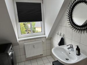 Koupelna v ubytování Comfortable apartment in Coswig + 14 fotografií
