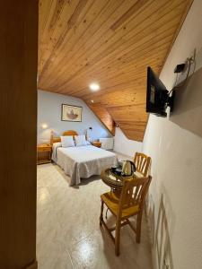 TV a/nebo společenská místnost v ubytování Hostal Marboré