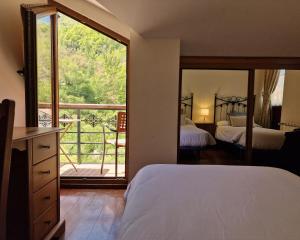 Postel nebo postele na pokoji v ubytování Apartamentos Remoña