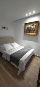 Postel nebo postele na pokoji v ubytování Camelia Prestige - Place de la Nation