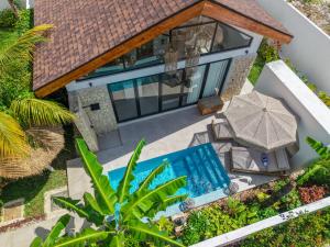 an aerial view of a villa with a swimming pool at Paje Emerald Escapes in Paje