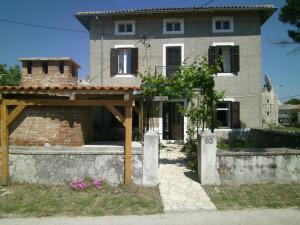 a large house with a brick at Holiday Home Lorraina in Štivan