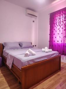 Postel nebo postele na pokoji v ubytování Guesthouse Te Lala