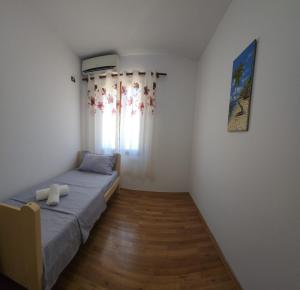 Postel nebo postele na pokoji v ubytování Guesthouse Te Lala