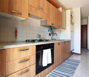 Kuchyň nebo kuchyňský kout v ubytování Cà Laguna