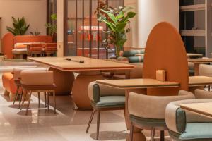 Posezení v ubytování Orange Hotel Beijing Daxing International Airport Terminal