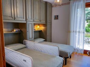 Ένα ή περισσότερα κρεβάτια σε δωμάτιο στο Relax a Roana - Garage e Wifi