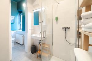 Kopalnica v nastanitvi Blue flat by GrazRentals best location & free parking + 8 fotografij