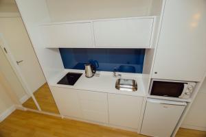 Köök või kööginurk majutusasutuses MY SUNSHINE APARTMENTS BATuMI