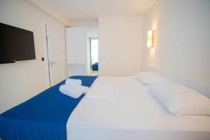 Voodi või voodid majutusasutuse MY SUNSHINE APARTMENTS BATuMI toas