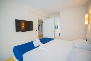 Voodi või voodid majutusasutuse MY SUNSHINE APARTMENTS BATuMI toas