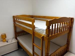 a couple of bunk beds in a room at Villa Delogu in Stintino