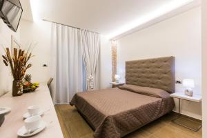 Ένα ή περισσότερα κρεβάτια σε δωμάτιο στο Casa Blue Sarantis +157 φωτογραφίες