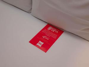 Rúm í herbergi á ibis Lima Reducto Miraflores