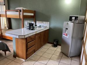 Köök või kööginurk majutusasutuses Hotel Guadalupe