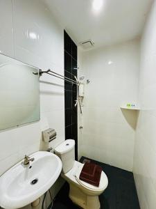 Koupelna v ubytování CHARISMA HOTEL