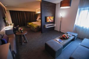 A television and/or entertainment centre at 72 Hotel Sharjah