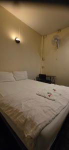 Postel nebo postele na pokoji v ubytování P.L.P Guesthouse - Mae Hong Son