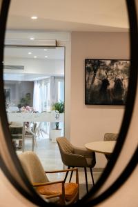 a view of a dining room with chairs and a table at Hotel Puerta del Mar - Adults Recommended in Nerja