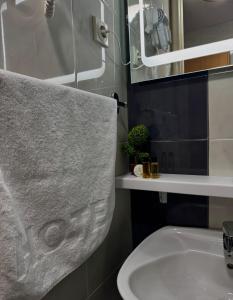 Koupelna v ubytování Hotel Petar
