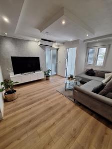 TV a/nebo společenská místnost v ubytování Apartment Mirjana