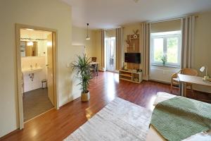 Μια τηλεόραση ή/και κέντρο ψυχαγωγίας στο Boardinghouse am Rosensee +3 φωτογραφίες