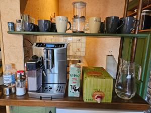 A kitchen or kitchenette at La Source d'Arimont