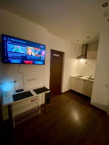 Η κουζίνα ή μικρή κουζίνα στο EksPorta Apartments 1