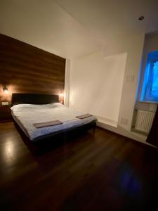 Ένα ή περισσότερα κρεβάτια σε δωμάτιο στο EksPorta Apartments 1