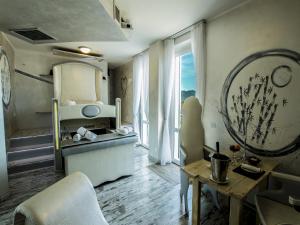 Kuchyň nebo kuchyňský kout v ubytování Hotel Butterfly