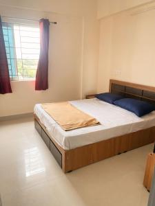 Ένα ή περισσότερα κρεβάτια σε δωμάτιο στο Stayzy Coliving