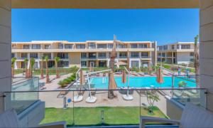 a view of a pool at a resort at Luxury Apartments in G-Cribs El Gouna in El Gouna +29 photos
