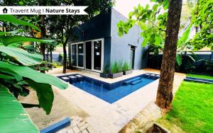 Afbeelding uit fotogalerij van The Calms Villa by Travent Mug in Rāmanagaram