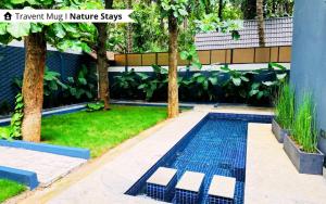 Afbeelding uit fotogalerij van The Calms Villa by Travent Mug in Rāmanagaram
