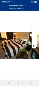 เตียงในห้องที่ Old town pyramids view