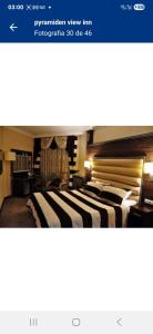 เตียงในห้องที่ Old town pyramids view
