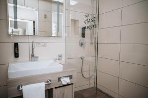 Koupelna v ubytování Feringapark Hotel Unterföhring