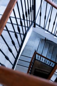 an overhead view of a stairwell in a building at Hotel Puerta del Mar - Adults Recommended in Nerja