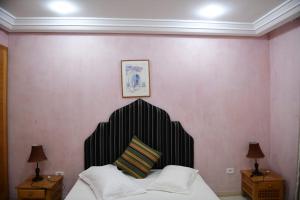 Postel nebo postele na pokoji v ubytování Pallax hotel