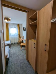 Postel nebo postele na pokoji v ubytování Hotel Antoň