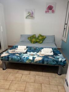 Postel nebo postele na pokoji v ubytování A un passo dal mare - House
