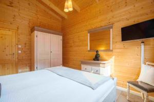 Et tv og/eller underholdning på Ferienhaus Casa-Bellissemar