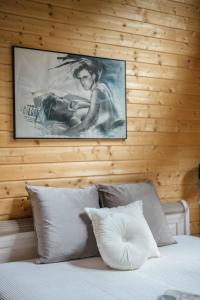 En eller flere senge i et værelse på Ferienhaus Casa-Bellissemar