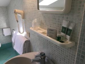 Koupelna v ubytování Hotel Tirrenia