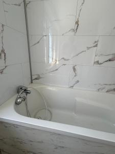 Koupelna v ubytování Cosy 50 M2 avec parking privé et vue mer LE PORTEL
